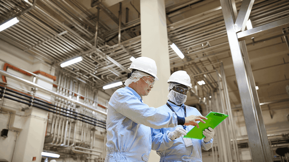 Two people working in manufacturing setting