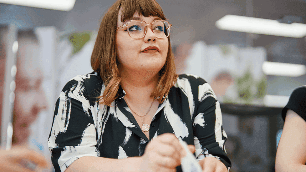 Graduate working in innovation session